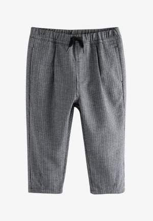 Fekete-fehér kiskockás, zsákzsinóros nadrág rugalmas derékrésszel és egyenes szárakkal, fehér háttéren, laposan kiterítve.