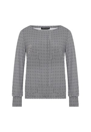 Czarny i biały długi rękaw z teksturowanym geometrycznym wzorem, okrągłym dekoldem i elastycznymi mankietami. Wykonany z miękkiej, lekkiej tkaniny.