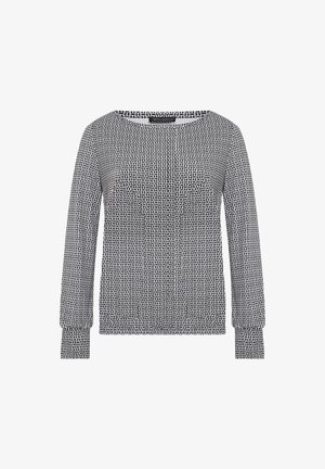 Czarny i biały długi rękaw z teksturowanym geometrycznym wzorem, okrągłym dekoldem i elastycznymi mankietami. Wykonany z miękkiej, lekkiej tkaniny.