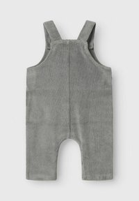 Salopette in corduroy grigio con bretelle, aperture della gamba ampia e cucitura sul retro, con una finitura morbida e testurizzata.