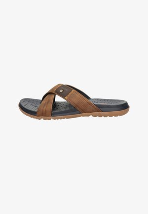 Brown and black men's slide sandal with textured footbed and crisscross straps on white background.