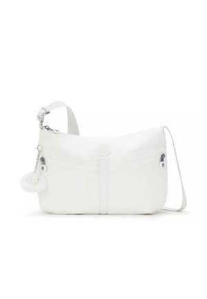 White shoulder bag with a smooth texture, features two front zip pockets, and a detachable fluffy charm. Adjustable strap and logo detail present.