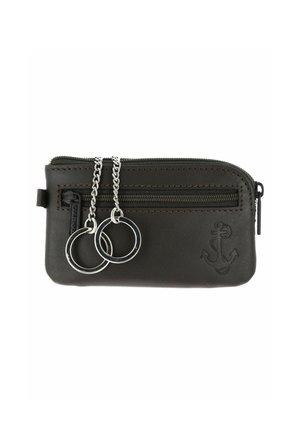 Small black leather pouch with front zipper, two silver key rings on chains, and embossed anchor symbol on the lower right corner.