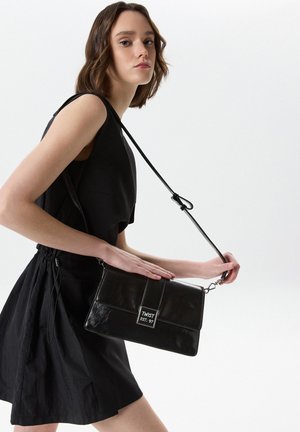 Twist, TWIST BAG FLAP BAG - Handtasche - black