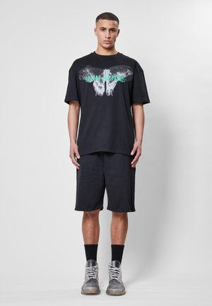 ESSENTIAL - Tracksuit bottoms - black