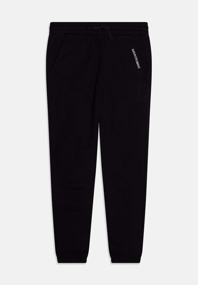 Black sweatpants made of soft fabric, featuring an elastic waistband with drawstring, two side pockets, and a printed logo on the left thigh.