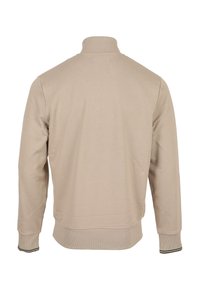 Felpa beige con zip e collo alto, polsini e orlo a coste. Presenta una trama liscia e sottili strisce verdi di accento sulle maniche.