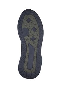 Sole of a shoe showing a black textured rubber surface with a patterned grip, featuring a central groove and star-shaped accents.