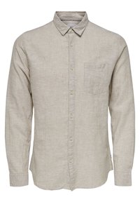 Camicia beige a maniche lunghe con colletto e taschino sul petto, realizzata in tessuto leggero e testurizzato.