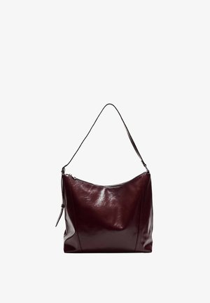 Burgundy leather shoulder bag with a smooth texture, curved shape, and single adjustable strap. Features a zippered top closure.