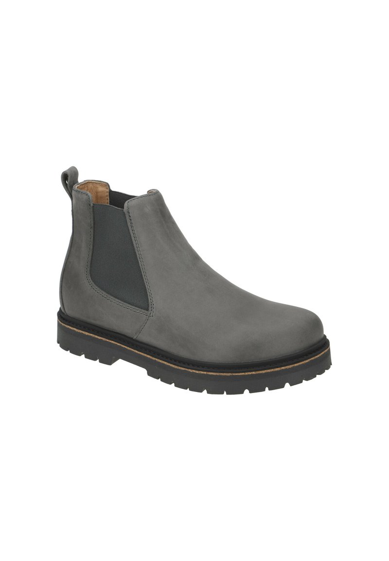 Grijze leren Chelsea-boot met elastische zijpanelen, ronde neus en een getextureerde rubberen zool. Voorzien van een trekband voor gemakkelijk aan- en uittrekken.