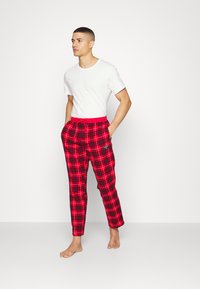 Björn Borg CORE PYJAMA PANTS - Calças de pijama - red/black