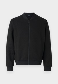 Svart bomberjakke med teksturert stoff, ribbede mansjetter og linning, full glidelås og rund krage. Enkelt, moderne design.
