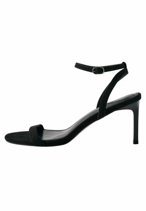 Sandali neri in suede con tacco alto, punta aperta, sottile cinturino alla caviglia e design elegante e minimalista.