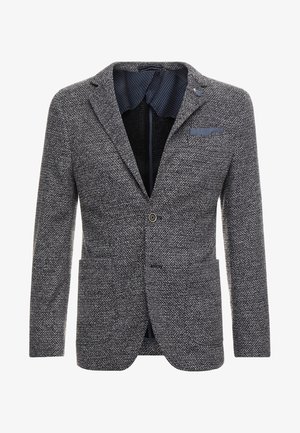 Blazer da uomo grigio texturizzato con rever a incavo, chiusura con un bottone, due tasche frontali e fodera interna blu navy con pois.