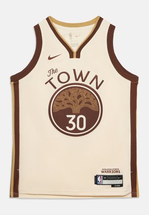 Basketbalový dres Golden State Warriors v krémovej farbe s hnedými a zlatými lemami, nápis "The Town", stromovým logom, číslom 30 a logami Nike a NBA.