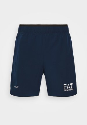 Pantaloni da bagno blu navy realizzati in materiale leggero. Vita elasticizzata con bordi neri. Presenta un logo bianco sulla parte anteriore e una brandizzazione sul lato.
