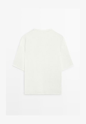 Plain white, short-sleeve T-shirt with a crew neck, shown from the back on a white background.