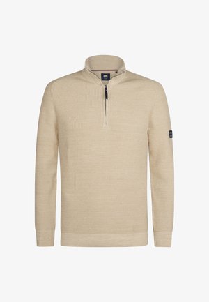 Beige pullover yang terbuat dari kain rajut tekstur, dilengkapi dengan kerah berdiri, ritsleting setengah, serta manset dan hem bergaris. Detail patch logo di sisi.