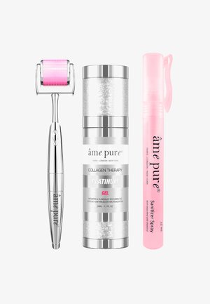 Kollagenbehandling gele i en sølv- og klar flaske, ansiktsrulle med sølvhåndtak og rosa rullehode, og en rosa desinfeksjonsspray.