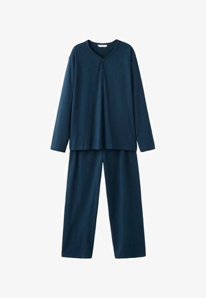 Navyblaues Freizeitoutfit bestehend aus einem langärmligen Oberteil mit Henley-Kragen und zwei Knöpfen, kombiniert mit weit geschnittenen Hosen aus ähnlichem Material.