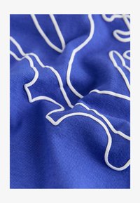 Unselected, blue football