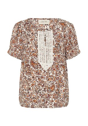 Blouse à manches courtes avec imprimé floral marron et orange, détail en dentelle crème sur le devant, et encolure ronde.