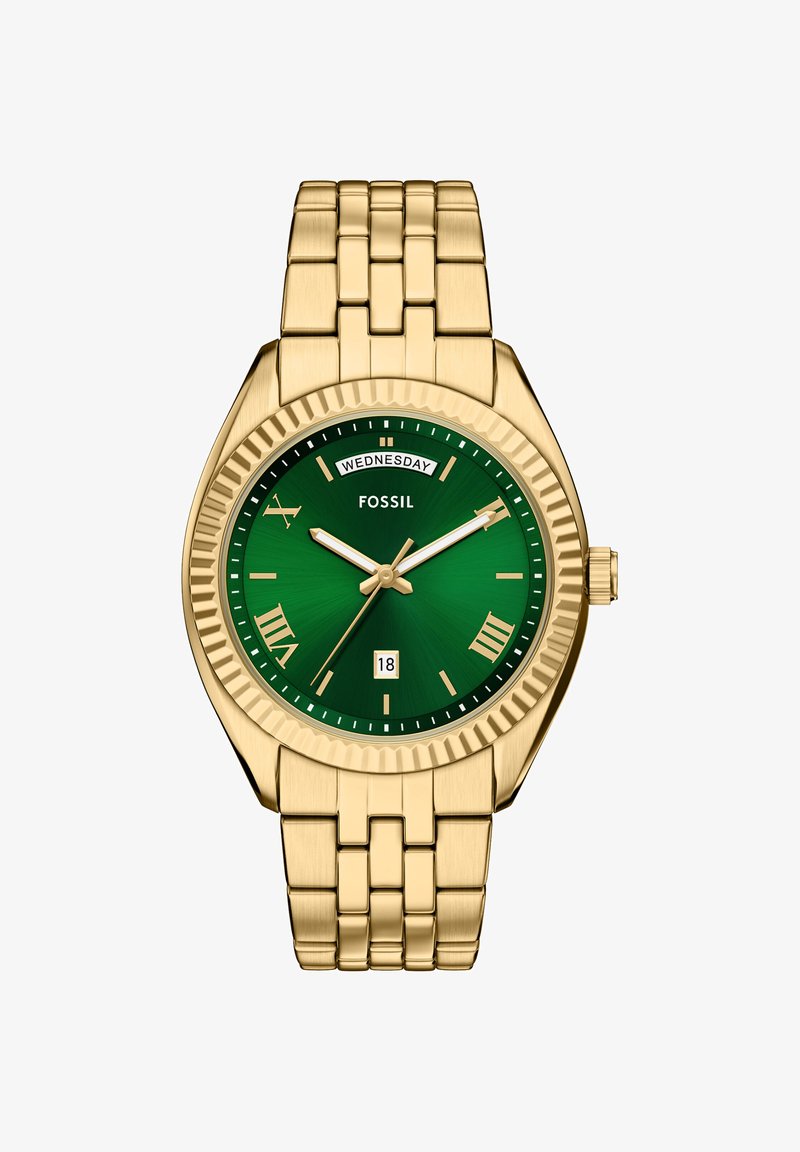 Montre-bracelet en métal doré avec cadran vert, chiffres romains, guichet jour à 12 heures, guichet date à 6 heures et mouvement à trois aiguilles.