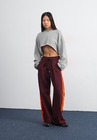 Nike Sportswear PANT - Treningo apatinė dalis - burgundy crush/bright crimson/dark pony