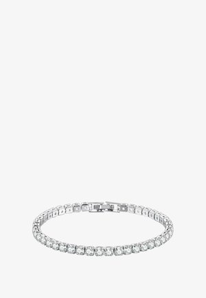 Bracciale in argento caratterizzato da una serie di pietre rotonde trasparenti montate su un bracciale flessibile con chiusura sicura. Superficie liscia, uniforme e finitura lucida.