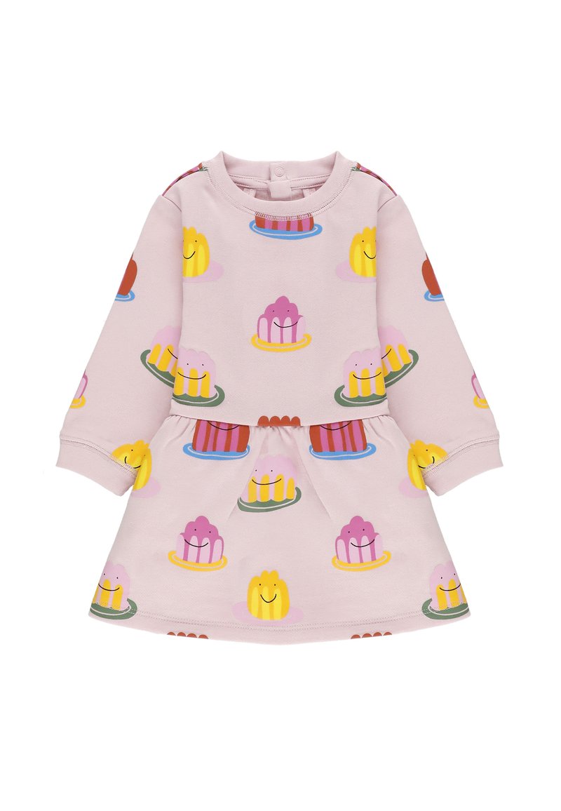 Abito rosa con maniche lunghe, caratterizzato da un motivo di dessert colorati e facce sorridenti. Materiale morbido, scollatura rotonda, gonna svasata.