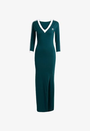 Teal fitted dress with a V-neck, three-quarter sleeves, white accents at the neckline and hem, featuring side slit and striped detailing.