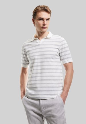 Short-sleeve white polo shirt with light gray horizontal stripes, featuring a pointed collar and textured fabric. Worn with light gray trousers.