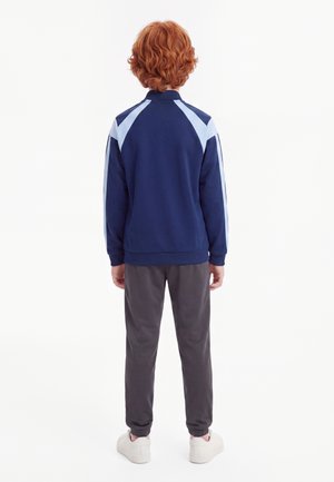 adidas Performance JUNIOR HOT UNISEX - Tréningová bunda - dark blue/glow blue