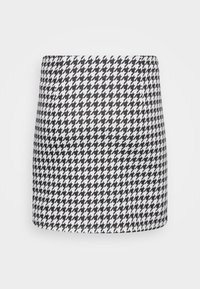 Svart och vit houndstooth-kjol, strukturerad design, slät textur, mitt-lår längd, med en figursydd midja och rak fåll.