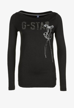 Černé tričko s dlouhým rukávem z měkké látky s lodičkovým výstřihem. Na přední straně má bílý grafický potisk květiny a nápis "G-STAR".