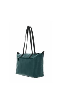 Sac fourre-tout en cuir vert avec poignées noires, fermeture éclair et détails de couture verticale. Texture lisse, forme rectangulaire et deux bretelles supérieures.