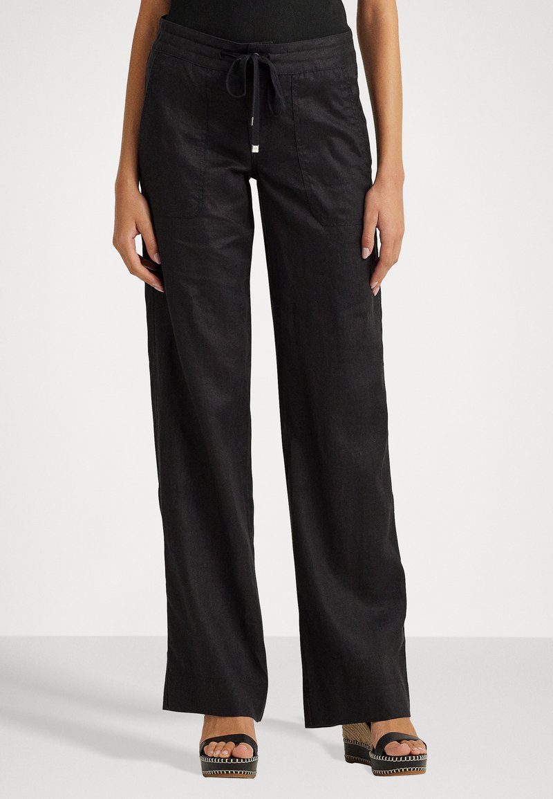 Black linen wide-leg pants with a drawstring waist, featuring two front pockets and a lightweight, textured fabric.