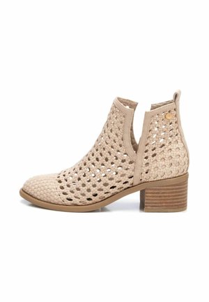 Korte laarzen - beige
