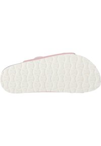 Vit gummisula med en texturerad, vågig mönstring och en pink kant längs kanten.