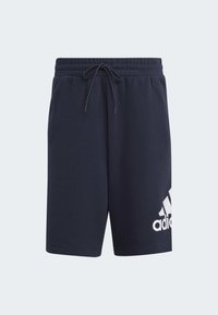 Námornícke modré športové šortky s elastickým pásom a šnúrkou na stiahnutie. Na ľavej strane je biele logo Adidas. Vyrobené z mäkkého materiálu.