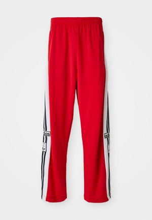 adidas Originals ADIBREAK - Tracksuit bottoms - better scarlet/black