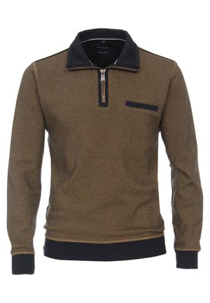 Brauner Reißverschluss-Pullover mit navyfarbener Kragen, strukturiertem Stoff, langen Ärmeln und einer Brusttasche. Gerippter Saum und Bündchen in Dunkelblau.