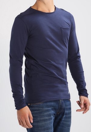 Navy long-sleeve T-shirt made of soft fabric, featuring a crew neck and a small chest pocket with a slim fit design.