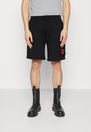 DIZZI - Shorts - black