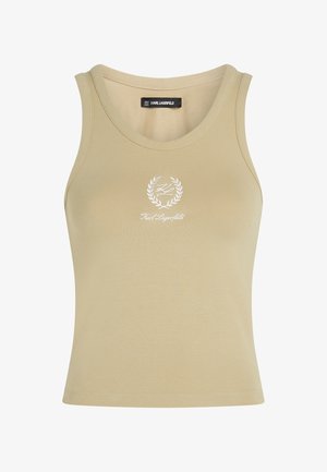 Beige tank top valmistettu pehmeästä kankaasta, jossa on pyöreä kaula-aukko. Edessä valkoinen brodeerattu logo ja laakerinlehti -design.