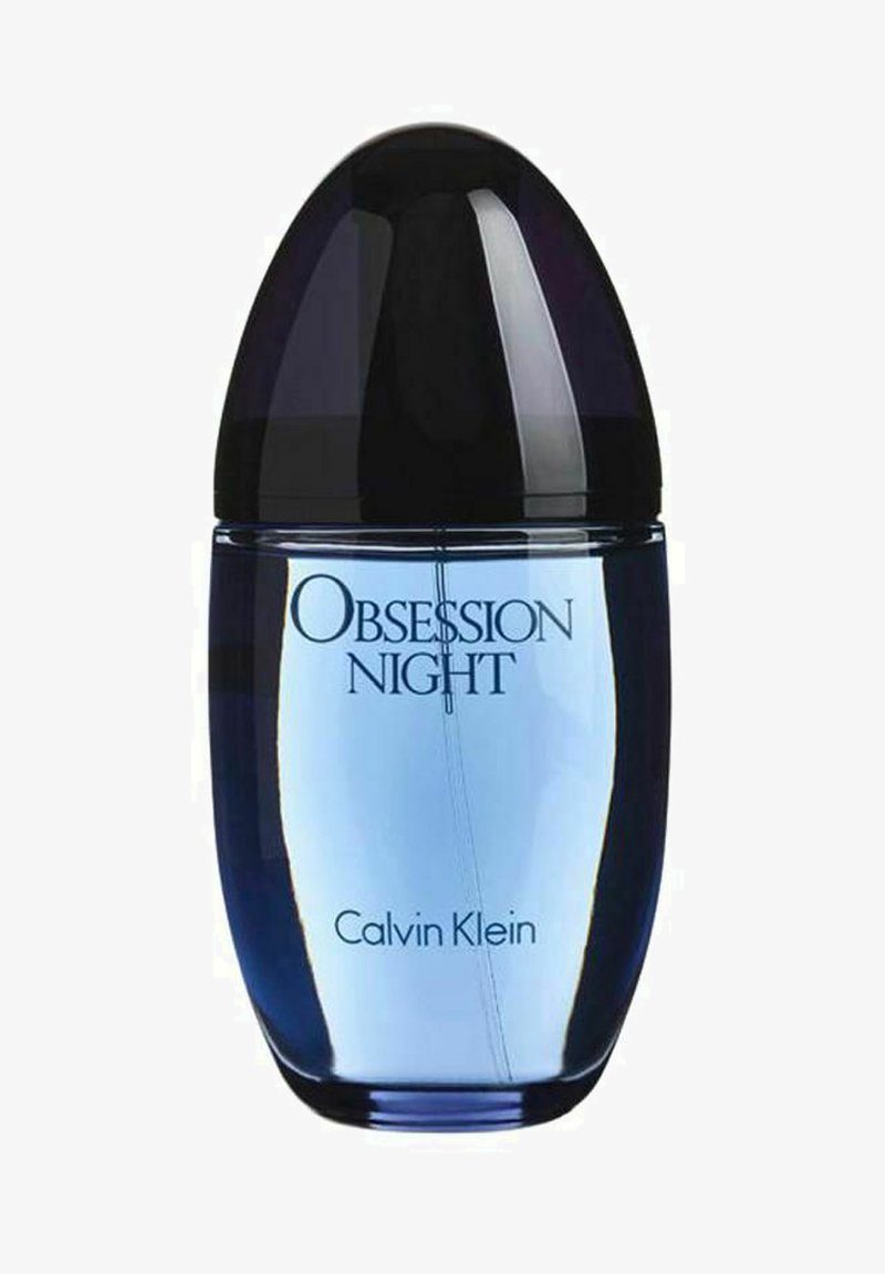 Sininen lasinen tuoksupullo, jossa on pyöreä pohja, kapeneva kaula ja tumman pyöreä korkki. Etupuolella on tekstit "Obsession Night" ja "Calvin Klein."