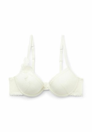 Soutien-gorge blanc en dentelle avec des bonnets rembourrés, motif floral, bretelles ajustables et finition décorative le long des bords. Fermeture par crochets au dos.