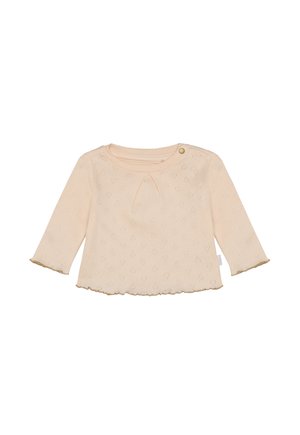 Licht perzikkleurig long-sleeve shirt met een ronde halslijn, gestructureerd hartpatroon en een gegolfde zoom. Afgewerkt met een klein gouden knoopdetail.