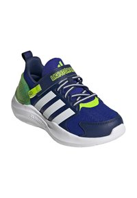 Blue athletic shoe with white stripes, mesh upper, and textured green accents. Features a cushioned sole and reflective laces.